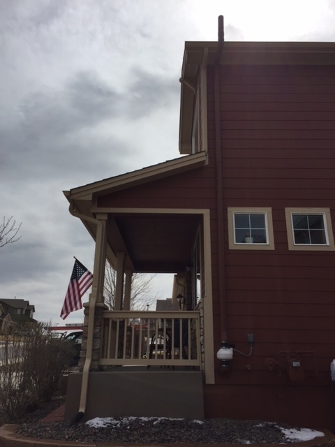 exterior of home with a radon mitigation installed