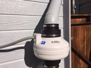 close up of fan housing in an exterior radon abatement system